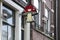 Street sign of a mushroom in the streets of Amsterdam, as a sign that you can buy magic mushrooms as a drug