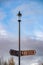 Street sign stating peak cavern and Peveril castle, located in Castleton, United Kingdom