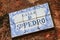 Street sign on a stone wall in Colonia del Sacramento, Uruguay