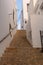 Street with stairs in the Andalusian town of Mojacar, in AlmerÃ­a southern Spain. Typical Mediterranean town