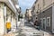 Street with steps and traditional architecture of Sitia town in eastern part of Crete island, Greece