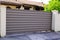 Street suburb home brown dark metal aluminum house gate garden access door