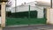 Street suburb home green classic house or gate garden access