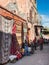 Street textile merchants in the bazaar of Marrakesh, Morocco, Af