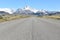 Street to Glacier National Park in El Chalten, Argentina, Patagonia with snow covered Fitz Roy Mountain in background