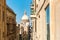 Street of Valleta, Malta`s capital. Cityscape in Sunny Day