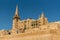 Street of Valleta, Malta`s capital. Cityscape in Sunny Day