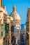 Street of Valletta with traditional balconies, Malta