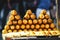 A street vendor roasts corn on a charcoal grill in Istanbul, Turkey