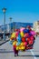 Street vendor selling colorful helium balloons