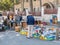 A street vendor sells various things by putting them out on the sidewalk on Derekh Shechem street - Nablus Road - in Jerusalem, I