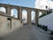 Street view on the Aqueduto da agua de Prata in Evora, Portugal. Aqueduct of Silver Water