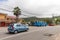 Street view with cars and bus, Anse Royale, Seychelles