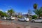 Street view of cars on the road and vintage ships in the port on embankment of Alanya Marina