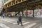 Street view of Chicago downtown under elevated train station in Chicago,USA