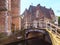Street view with houses and canal in c, Holland at sunset