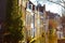 Street view with houses and canal in Delft, Holland at sunset