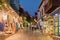 Street view in the Kas old town with boutique shops at evening, Turkey