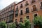 Street view looking up at apartment block in city Madrid