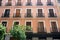 Street view looking up at apartment block in city Madrid