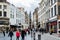 Street view of old downtown with lots of people walking at the street of Brussels, Belgium