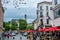 Street view of old downtown with lots of people walking at the street of Brussels, Belgium