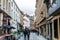 Street view of old downtown with lots of people walking at the street of Brussels, Belgium