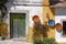 Street view with old house, displaying pottery in Obidos, Portugal