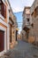 Street view of old town of Rhodes, Greece. Paved roads and pavements with colorful houses