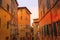 Street view in Siena, Italy with medeival houses
