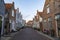 Street view in small Dutch town Goedereede on sunset, Zeeland, Netherlands