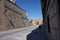 Street view in Toledo showing masonry fortified arabic walls