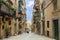 Street view at Valetta, Malta with traditional limestone buildings and their characteristic balconies