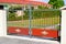 Street vintage suburb home red classic door silver metal retro classical house gate