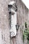 Street wall religious niche with small sculpture of Maria with Jesus