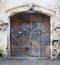 The street wooden aged gates to the old public medieval brick