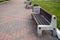 Street wooden benches with a marble base have been standing since Soviet times on a cobbled sidewalk in a city street