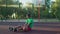 Streetball player listening music on outdoor court