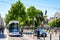 A streetcar driving up La Canebiere is passing by the 1870`s war memorial in Marseille, France