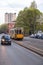 Streetcar, lightrail tram carrying passengers within the city of Milano, Italy