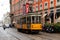 Streetcar, lightrail tram carrying passengers within the city of Milano, Italy