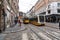 Streetcar, lightrail tram carrying passengers within the city of Milano, Italy