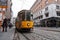 Streetcar, lightrail tram carrying passengers within the city of Milano, Italy