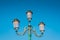 Streetlight vintage style, retro Lamppost on blue sky background