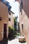 Streets of Annecy with Ancient Buildings, Bicycle and Canal on a Sunny Day