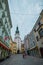 Streets of Bratislava, Slovakia, on a dull day, some people walking on the street, but not much. Sankt michael gate in the