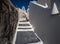 Streets and churches of the white city of Santorini under the bright sun. Greece