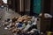 The streets of the city are full of rubbish, created with Generative AI technology