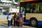 The streets of Kuala Lumpur during quarantine. People are trying to network on a bus. People are allowed into public transport