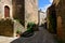 The streets of the medieval village in Europe, France, Occitanie, Aveyron, La Couvertoirade, in summer, on a sunny day